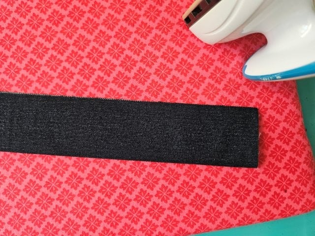 Fold the strap lengthwise