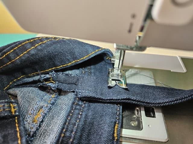 Sew the strap along the top edge of the bag