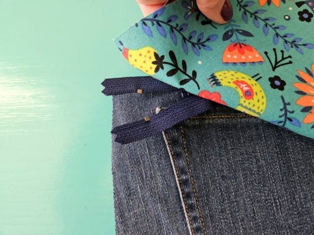 Open the zipper about 1-inch