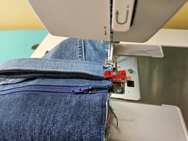 Basting the strap to the outer fabric piece