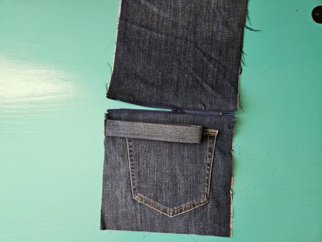Open up the zipper half way