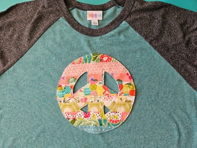 Place the peace sign on your shirt or sweatshirt